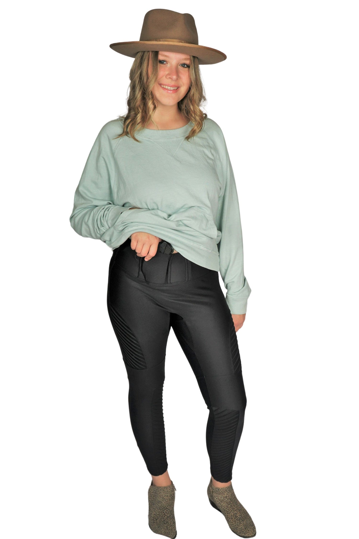 Eclipse Black Motto Concealed Carry Leggings paired with the Tomboy Sweatshirt by Girls with Guns